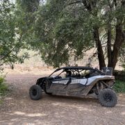 Can Am at campsite along trail