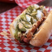 a hot dog with toppings