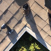 a man standing on a roof