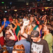 a large group of people dancing
