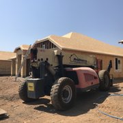 a construction worker working on a house