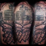American armor shield tattoo
