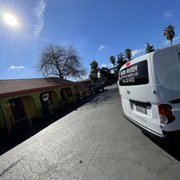 a white van parked in a parking lot