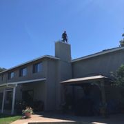 Leo cleaning chimney
