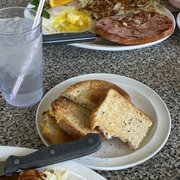 Her breakfast where ham steak looked appetizing.