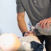 Adult ventilation on Voice-Assisted Manikin station in office.