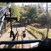 First person picking up poles