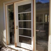 Refinished exterior door and sidelites.