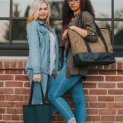 Our Shopper Tote (small) and East West Tote (large).