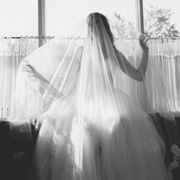 Artistic bridal portraits with long veil