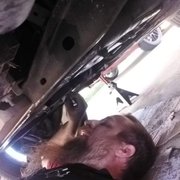 Working on a customer's car.