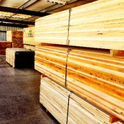 stacks of lumber in a warehouse