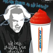 a man in a black shirt and a cup of ice cream