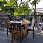 Nice upstairs patio has 4 tables like this with a view (and noise) of 2nd Street.
