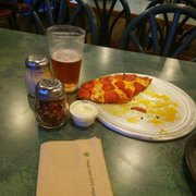 The perfect combination of pizza, beer and plenty of parmsan, I love the cheesy goodness.