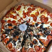 Yum. Half pepperoni/ half pepperoni, mushrooms and olives.