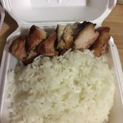 Chicken skewer and a side of rice. Togo