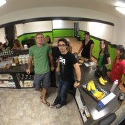 a group of people in a kitchen