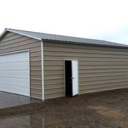 20x35x9 Two Car Garage  with a 16x8 sectional overhead garage door.
