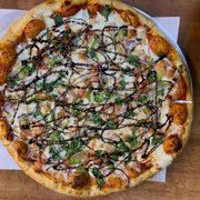 a whole pizza with toppings