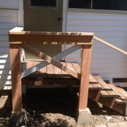 Dry rot AFTER:  Dry rotted timbers have been replaced, next step is painting to protect wood from the elements and keep it strong.