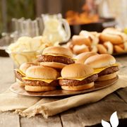 a plate of hamburgers and potato chips