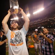 U.T.B. Studios founder Ev Durán shoots MVP Madison Bumgarner immediately following the SF Giants 2014 World Series win in Kansas City.