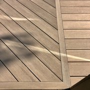 a close up of a wooden deck