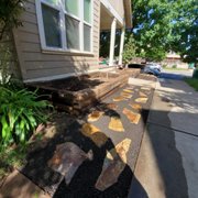 Raised planter beds and slate rocks installed