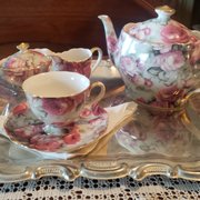 Victorian Tea Service is set up the parlor