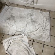 The towels were hung on the rack, but they were not only stained, but they were soiled  Yuck!!!