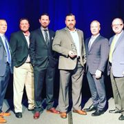 Tugwell Roofing Estimating Team - Jeff, Dan & Chris receiving our prestigious GAF President's Club Award from the GAF President.