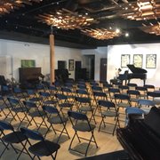Our recital hall st up holds up t 100 guests.