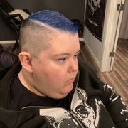 Clipper fade cut , hard part and vivid fashion blue.