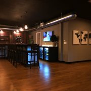 a bar with a television in the background