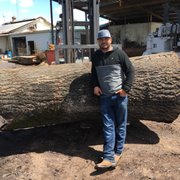 Recycling by milling logs into furniture. Durham Ca.