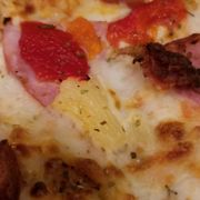 Nothing but a few pieces of pineapple and a bacon or two.