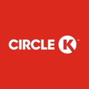 a red background with a white circle k logo