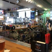 a bar with a beer in a glass