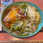 a plate of mexican food on a table