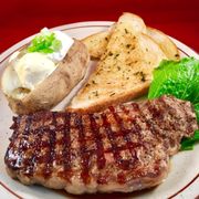 Our 8oz New York Choice Steak dinner! Served with soup, salad, choice of potato and garlic toast!