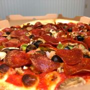 a pepperoni and olive pizza