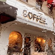 a view of the outside of a cafe