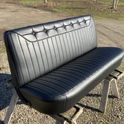 Full rebuild of ford pickup seat. Repaired springs new foam and custom made cover.