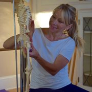 Teaching moment with mini model skeleton.
