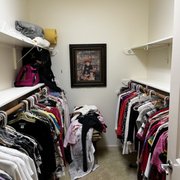 Lower shelving and garment pole added to help a handicapped lady reach her clothes