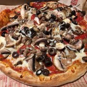 The Mad Dog! Added mushrooms & black olives! 50% extra everything! Outstanding! My best pizza yet!