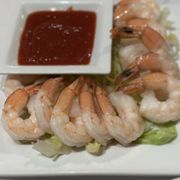 a plate of shrimp and lettuce