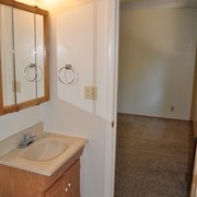 Bath facing vanity/sink.