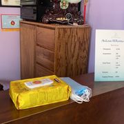Hand sanitizer and masks are provided